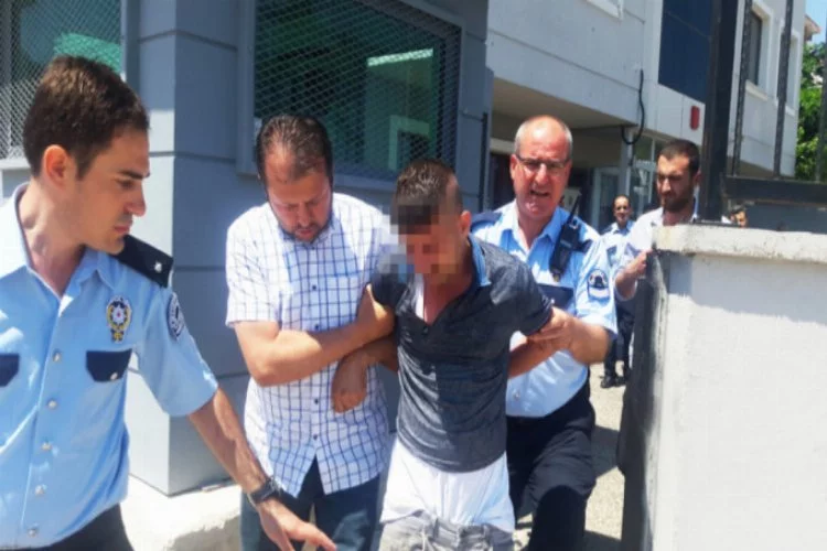 Bursa'da polise silah çekip, kolunu ısırdı