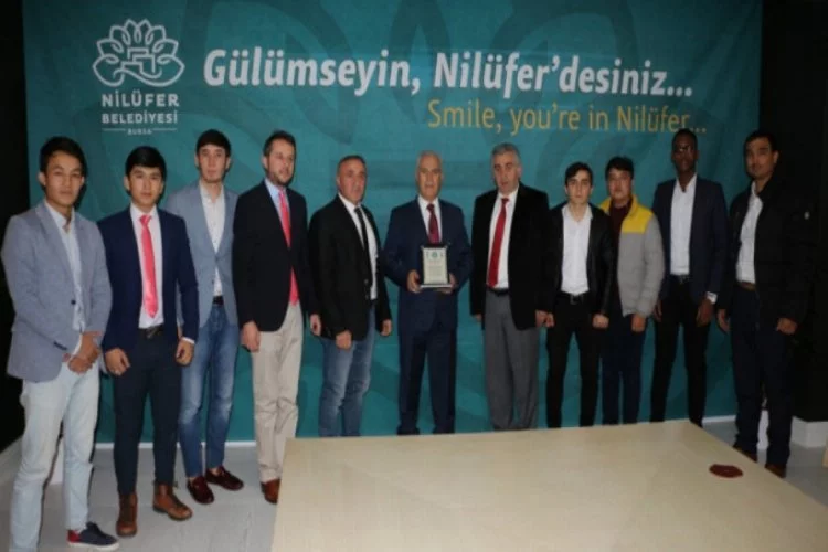 Türkiye Diyanet Vakfı'ndan Bozbey'e teşekkür plaketi