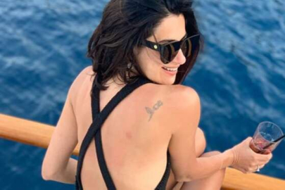 Üstsüz pozlarıyla gündem olmuştu! Nesrin Cavadzade plajda babasıyla poz verdi