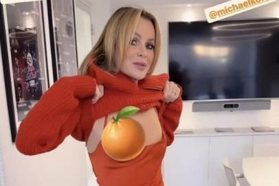 Amanda Holden kazağını kaldırıp göğsünü gösterdi