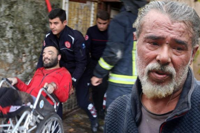 Kahraman baba engelli oğlunu alevlerin arasından kurtardı