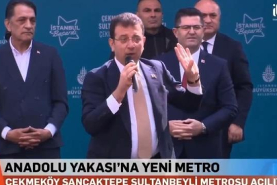 Mitingde çok konuşulacak anlar! Elindeki Kuran-ı Kerim ile tepki gösterdi! İmamoğlu böyle cevap verdi: Allah ıslah etsin!