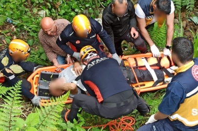 Rize'de arazide ağaç keserken yaralanan adamı ekipler kurtardı