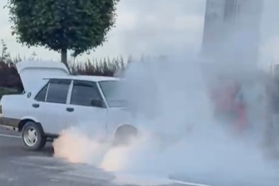 Ankara'da Tofaş araç yandı, vatandaşlar yangın tüpleriyle müdahale etti