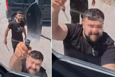 'Yol verme' tartışmasında TIR'ın camlarını satırla kırdı