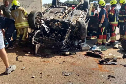 Takla atan otomobilde sıkışan iki kişi kurtarıldı