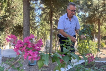 Bursalı öğretmen mezarlığı çiçek bahçesine dönüştürdü