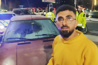 Seyir halindeyken yanan otomobili esnaf söndürdü