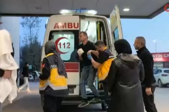 Bursa'da eli traktörün hidrolik sistemine sıkışan çiftçi yaralandı