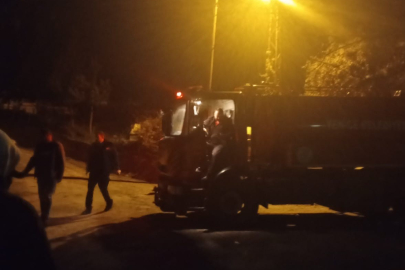 Karabük'te minibüsün motoruna sıkışan kedi kurtarıldı