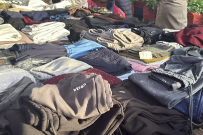 Eşofman çalan çocuğu herkesin ortasında iple bağladı!