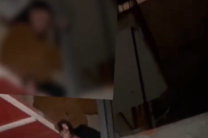 Eskişehir'de kumar oynatılan mekana kapıyı ikiye bölerek giren polis, çatıdan kaçmaya çalışanları yakaladı