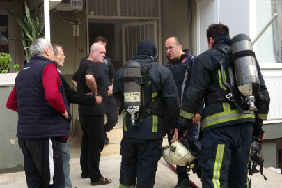 Antalya'da evleri yanan genç kızı anne ve babası sarılarak teselli etti