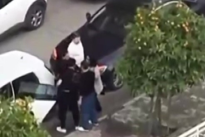 Adana’da koca eşini tartaklayıp, otomobiliyle aracına defalarca vurdu