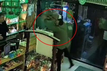 Bursa'da market sahibine su kolisi ve sandalye fırlattı