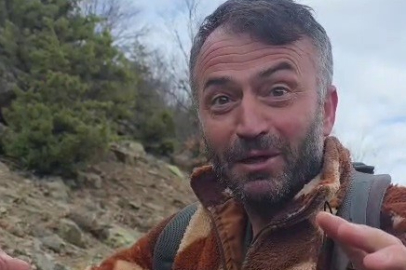 Kuş gözlemi için çıktığı arazide ayı ile karşı karşıya kaldı