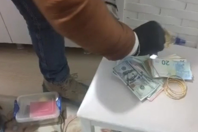 Muğla'da polis, 'rüşvet dolarları'nı ele geçirdi