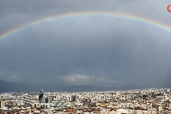 Bursa'da yağmur sonrası gökkuşağı şölenis