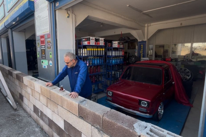 Bursa'da kiracıyı çıkarmak için oto lastikçi dükkanının önüne duvar ördürdü