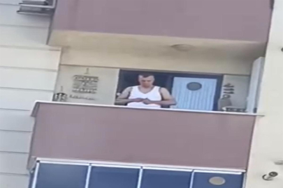 Balkonda silah şarjörüne mermi dolduran şüpheli yakalandı