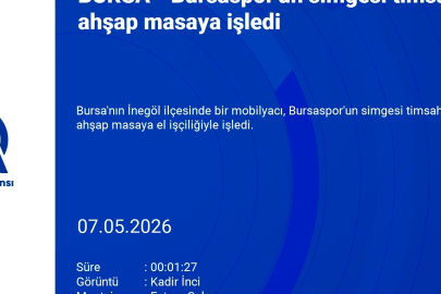 Bursaspor'un simgesi timsah figürünü ahşap masaya işledi