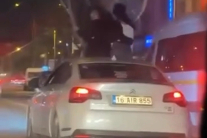 Bursa'da otomobilin tavanına oturan şahıslara ceza!