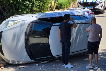 Muğla'da duvara çarpan otomobil devrildi