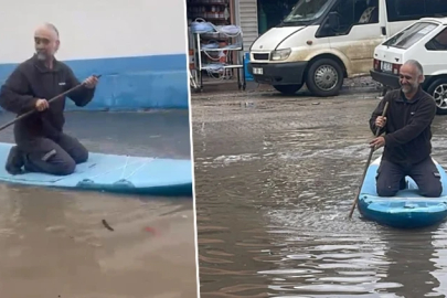 Adana'da etkili olan sağanak sonrası sokakları su bastı: Araç tamir ustası SUP board yaptı!