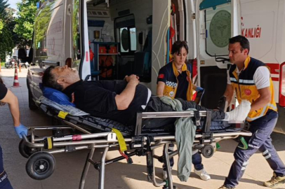 Bursa'da üzerine iş makinesi devrilen işçi yaralandı