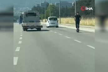 Bursa'da elektrikli scooter üzerinde tehlikeli yolculuk! Ölümle dans etti