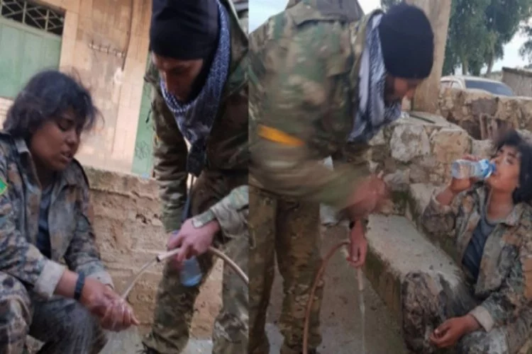 ÖSO askeri esir aldığı YPG'li teröriste su verdi