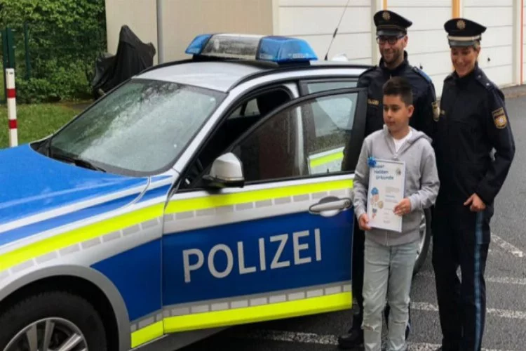 Alman polisinden Kenan'a 'Süper Kahramanlık Sertifikası'