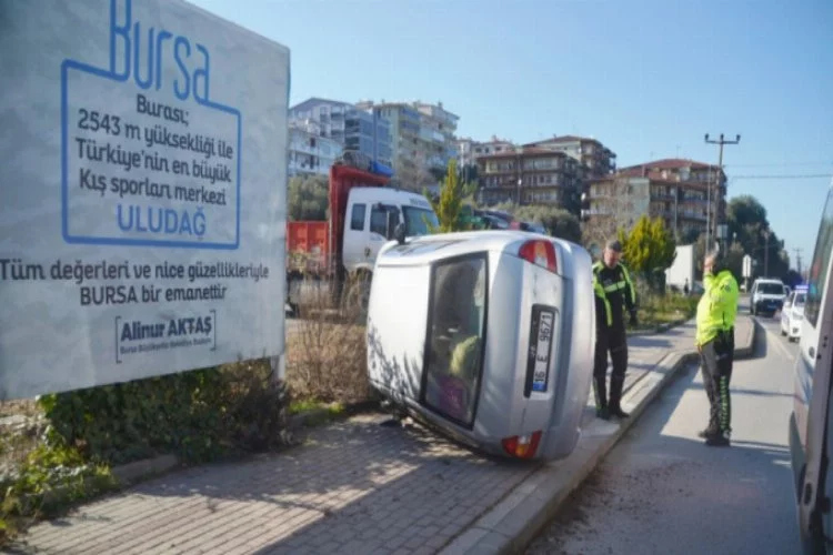Bursa'da takla atan araçtan sağ kurtuldu