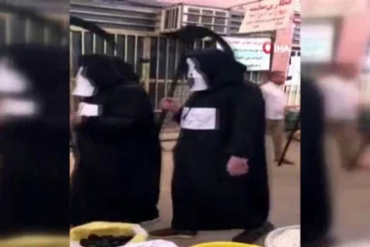İran'da belediye çalışanları halkın arasında böyle dolaştı