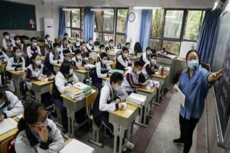 Virüsün ortaya çıktığı Wuhan'da okullar açıldı