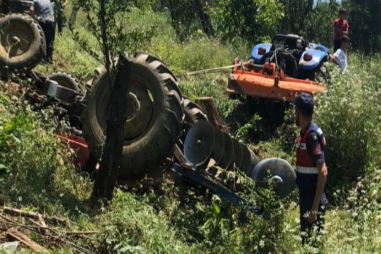 Bursa'da devrilen traktörün altında kalan muhtar öldü
