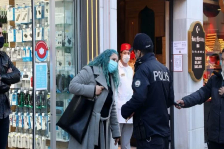 Maske takmadığı için ceza yazılmak istenen kadın polise zor anlar yaşattı