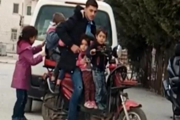 Bursa'da 5 çocukla birlikte elektrikli bisiklete bindi!