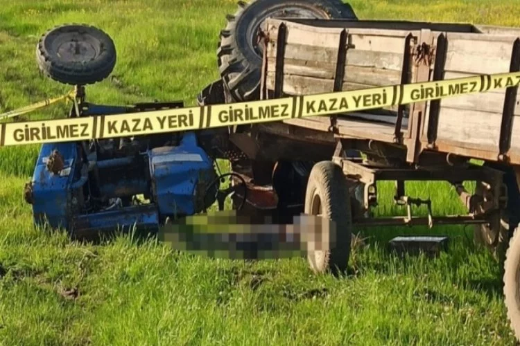 Bursa'da traktörün altında kalan çiftçi can verdi