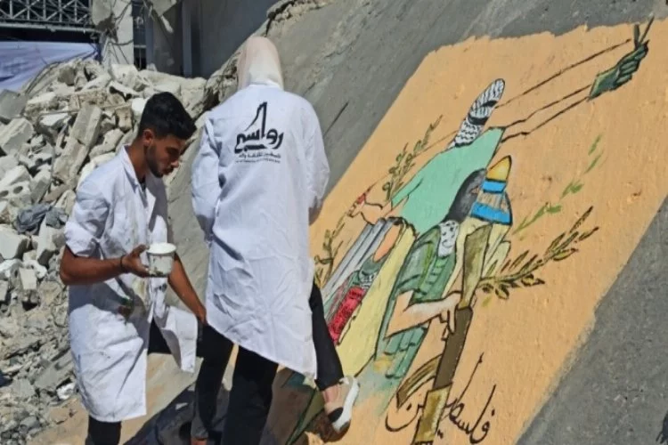 Filistinlilerden İsrail'in saldırılarına grafitili tepki