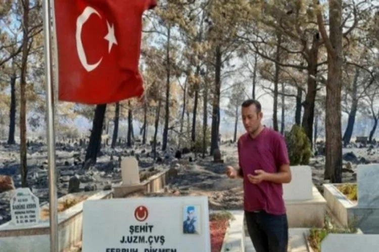 Çıkan yangında şehit kabri ve Türk bayrağı yanmadı